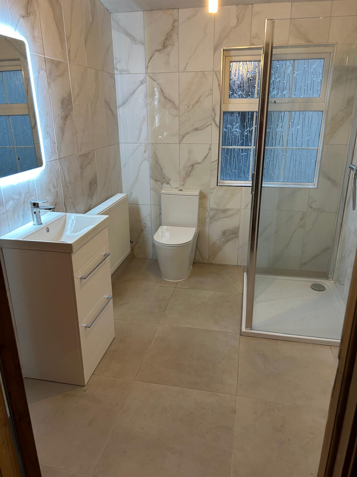 Complete bathroom renovation with marble tiling in Kildare home