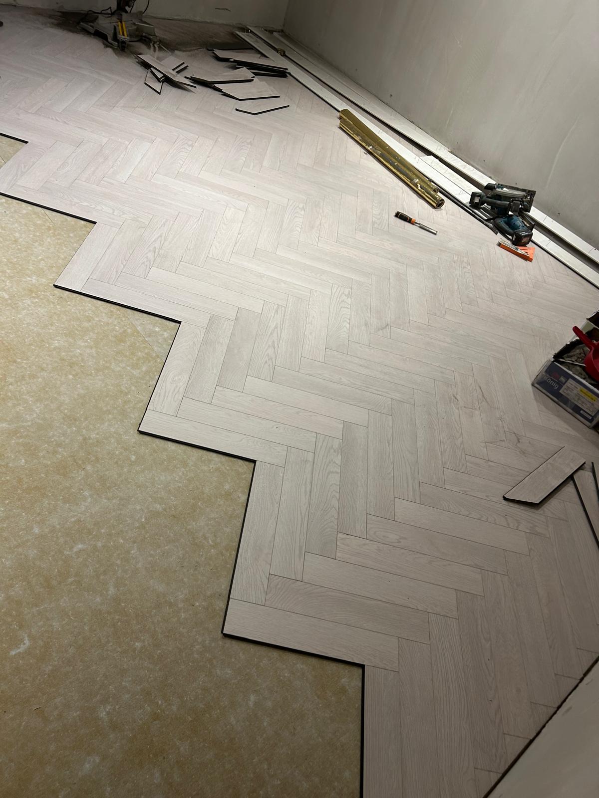 Herringbone oak flooring installation in Dublin living room