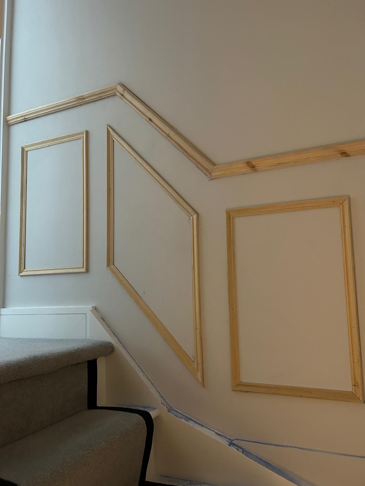 Angled staircase wall panelling with seamless joins in Dublin home